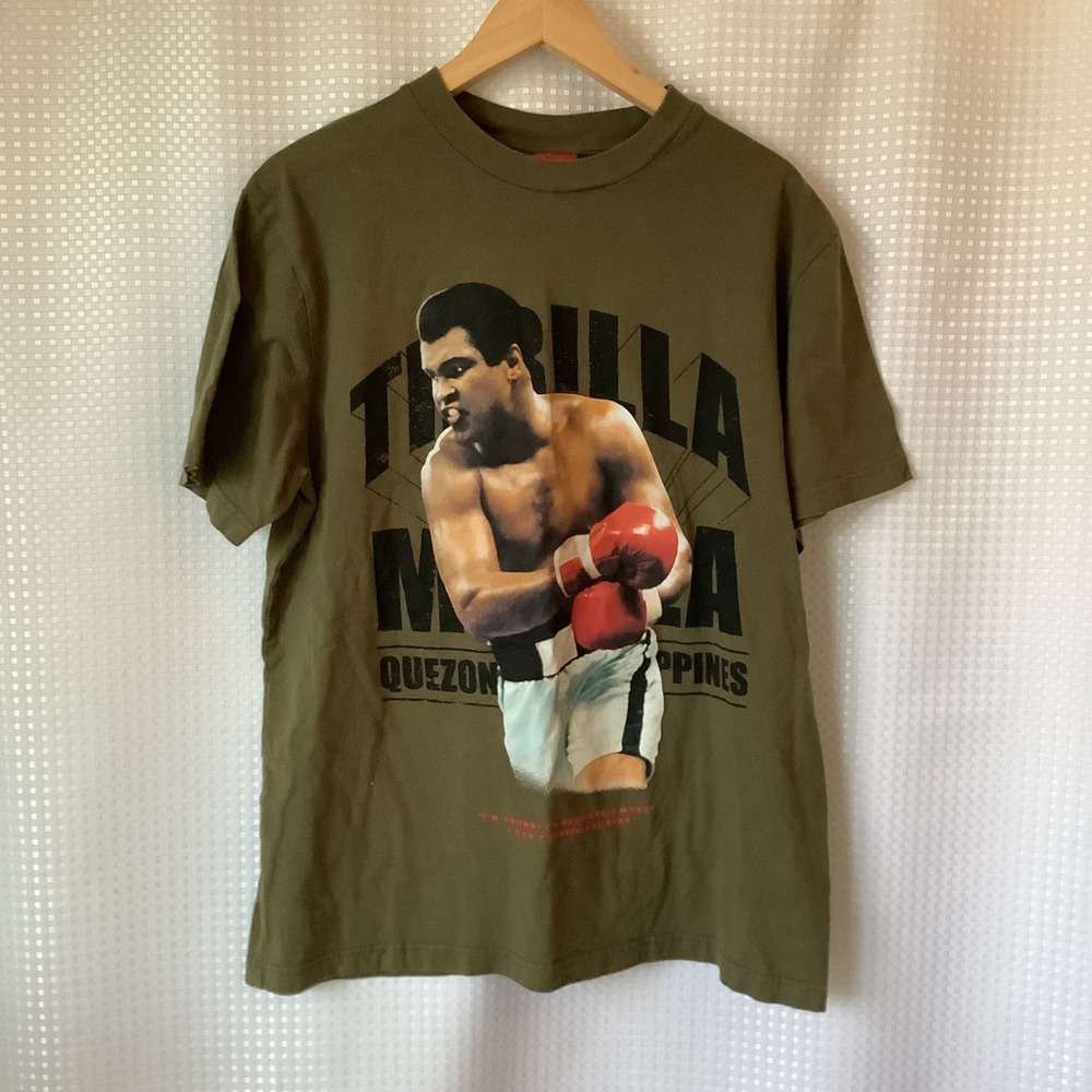 Shoe Palace Muhammad Ali "Thrilla in‎ Manila" graphic t-shirt.